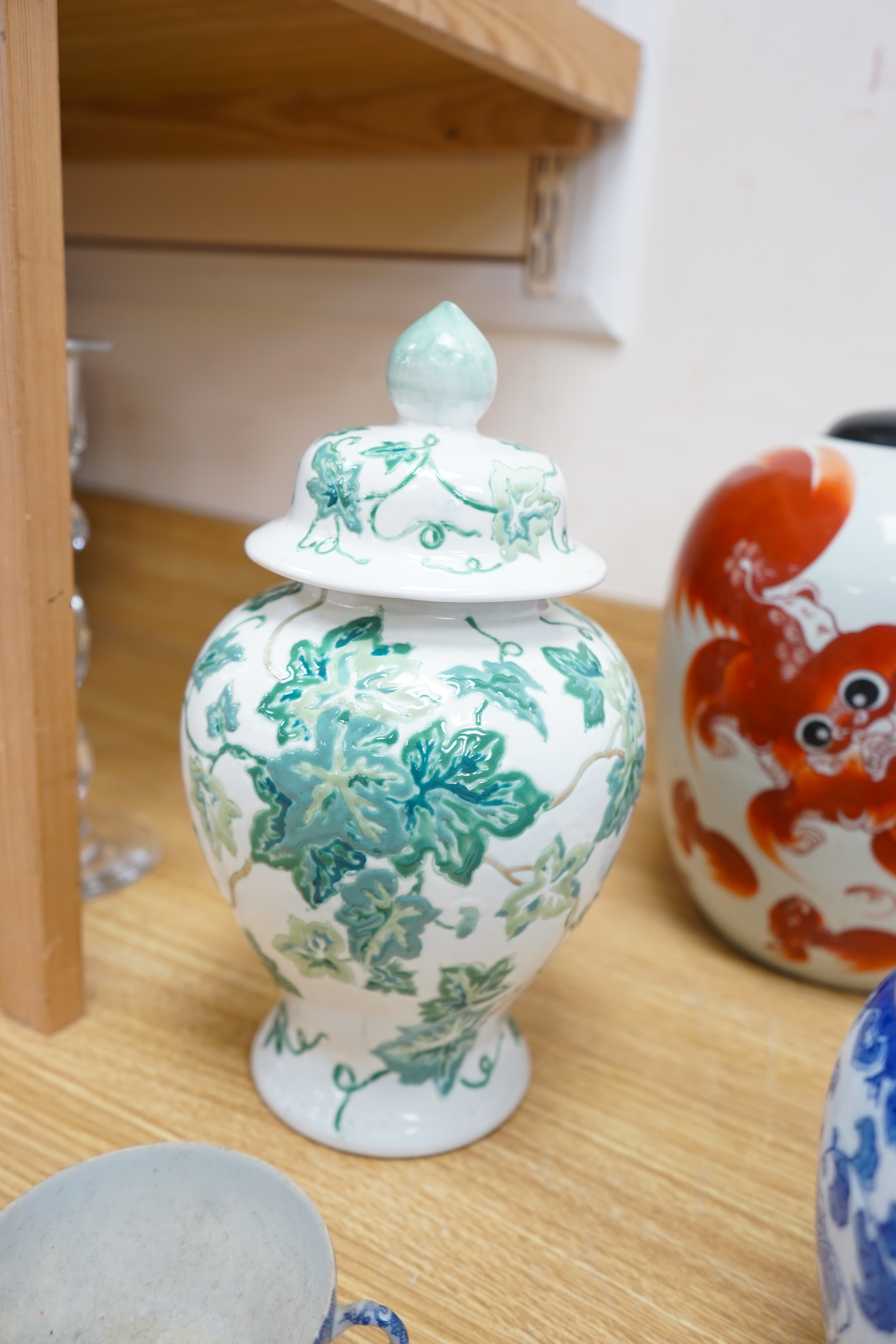 A Chinese Republic lion jar and cover, a later jar and cover and a blue and white jar and a vase two dragon dishes, etc., tallest 32cm high. Condition - fair